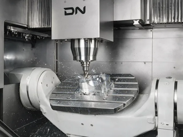 Aerospace aluminum structural bracket — 7075-T6 machined part with complex pocket geometry and fastener pattern, photographed on dark inspection surface with directional lighting revealing machined surface quality